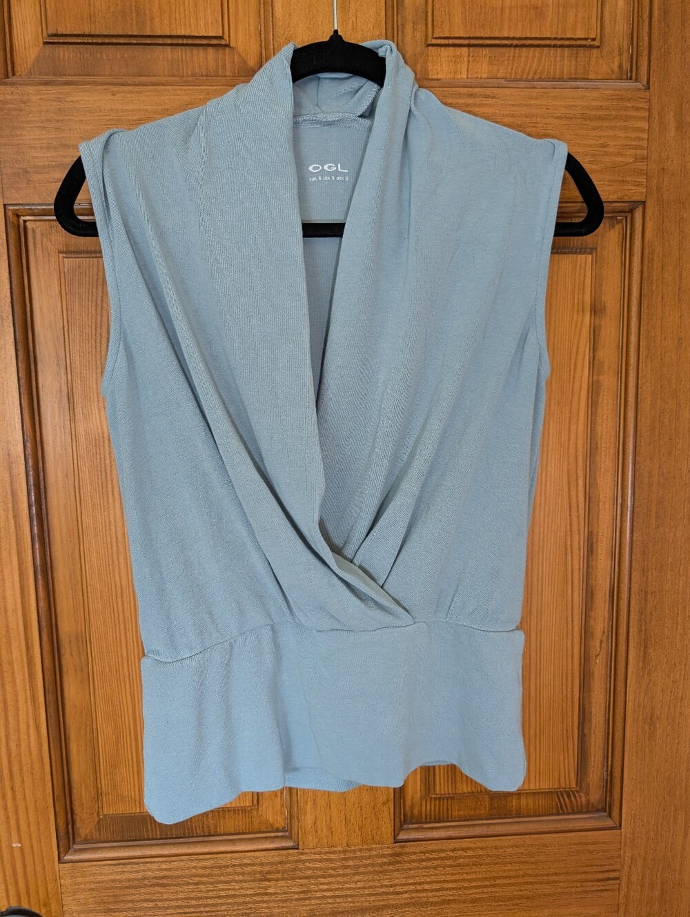 OGL Move Surplice Sleeveless Top